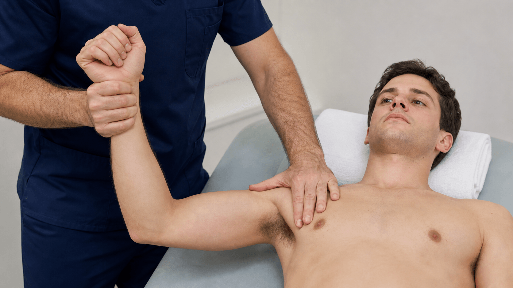 Supine shoulder apprehension and relocation examination setup